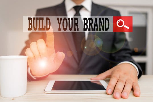 Conceptual hand writing showing Build Your Brand. Concept meaning enhancing brand equity using adver