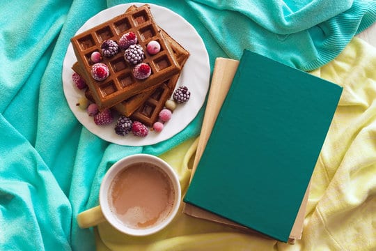 Homemade Waffles with Berry. Relax desk table concept books hot coffe
